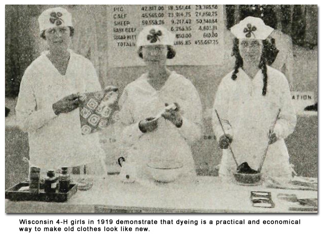 Wisconsin 4-H girls in 1919 demonstrate that dyeing is a practical and economical way to make old clothes look like new.